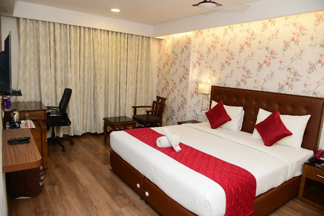 Premium room at Thechi Hotel, Hosur